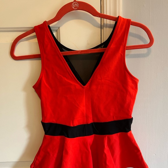 Bebe Peplum Top - Picture 2 of 3